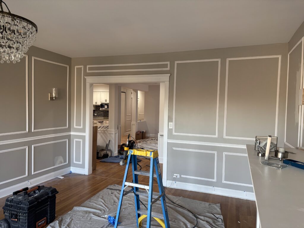 wainscoting chicago installation progress living room shows wall trim installled before painters have begun